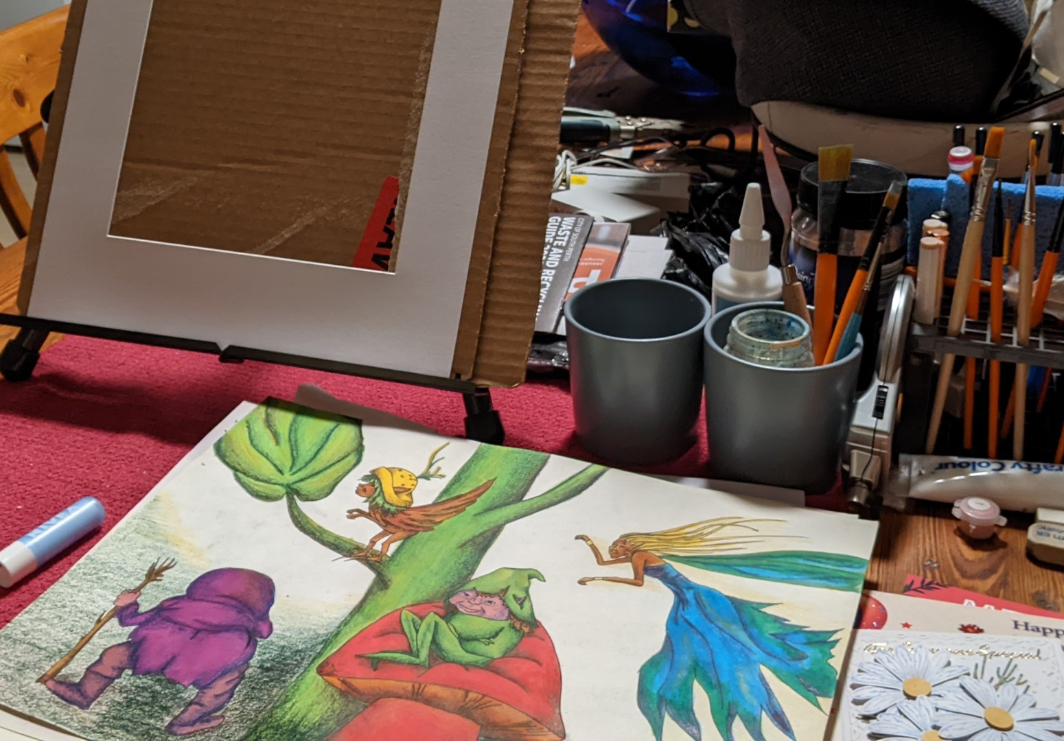 Sandra Burns ART Studio - a sneak peek inside the studio where the artwork is made - drawings, paintings, the easel, paint brushes, water mugs and more