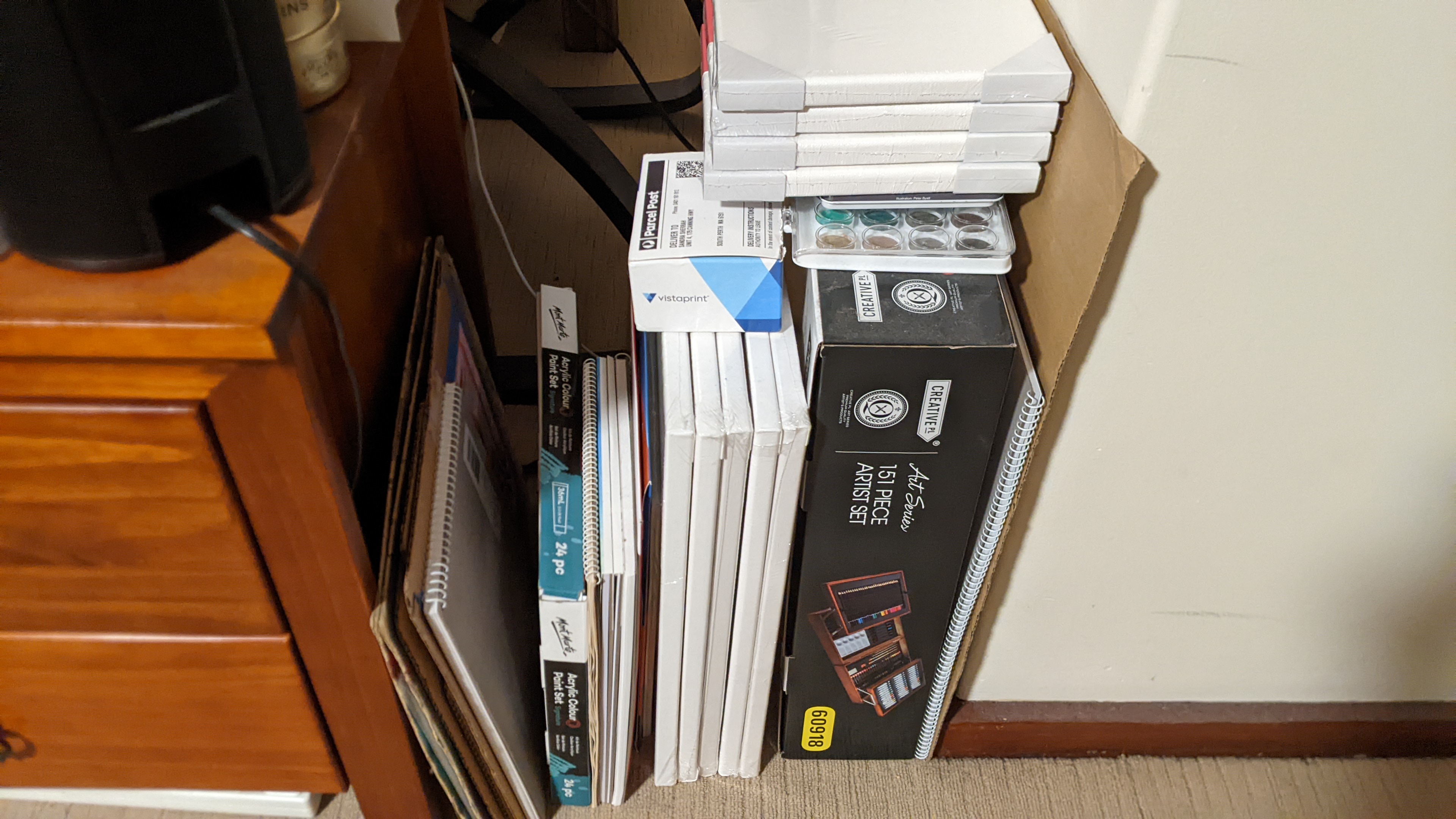 canvas for painting - Sandra Burns ART - artwork canvases stacked in the studio ready for painting