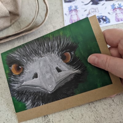 EDDIE THE EMU - Sandra Burns ART - nature art, Australian Emu painting, with amazing eyes looking at you, black white grey gray feathers, green background - original artwork reproduced on greeting card