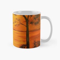 PEACEFUL SUNSET - Sandra Burns ART - nature art, a glorious sunset of red and yellow, golden sun reflecting across the water, framed by black silhouette trees, original artwork reproduced on ceramic mug